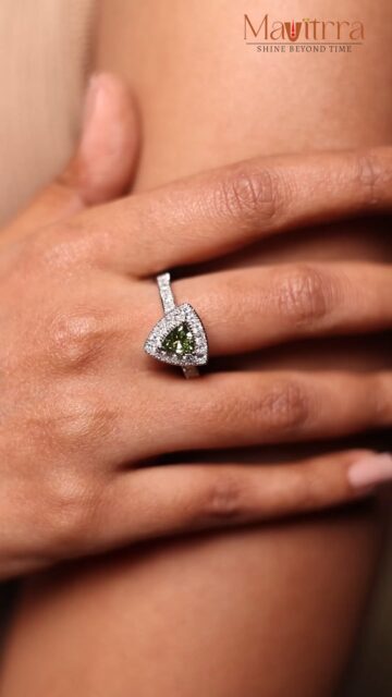 Bold. Balanced. Beautiful. The Green Stone & Diamond Triangle Ring by Amara is crafted for the woman who owns her sparkle — and the room. 💎💚 #AmaraByMavitrra

#AmaraByMavitrra #GreenStoneRing #DiamondRing #StatementRing #TriangleRing #LuxuryJewellery #ModernElegance #BoldAndBeautiful #GemstoneJewellery #AmaraStyle